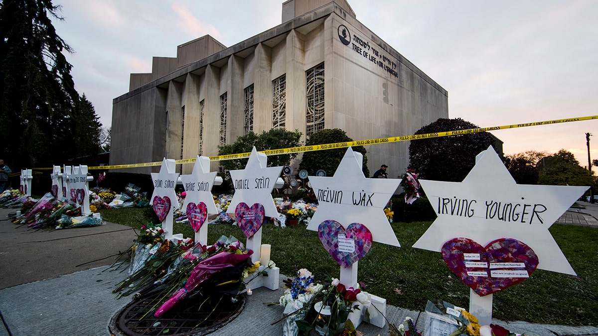 A makeshift memorial stands outside the Tree of Life 