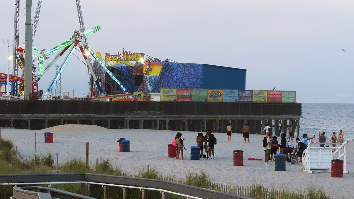 Young people gather peacefully on the beach in Seaside Heights, N.J