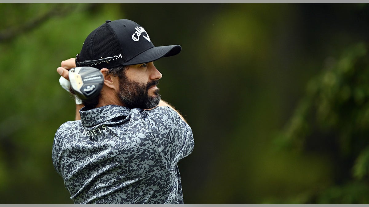 Adam Hadwin swings golf club