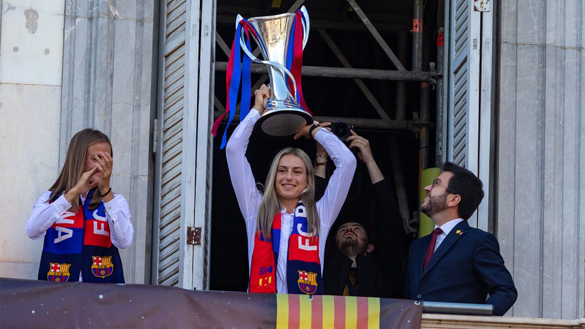 Alexia Putellas lifts trophy
