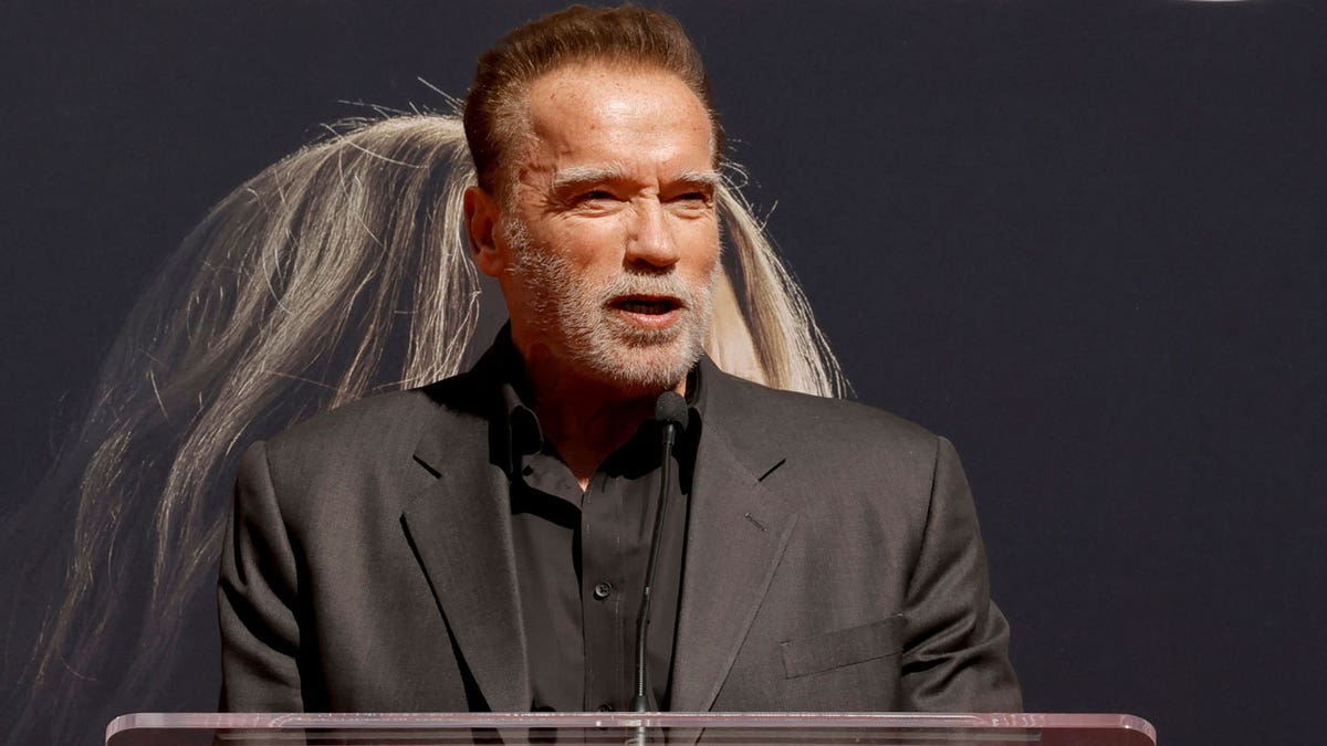 Arnold Schwarzenegger attends a star ceremony