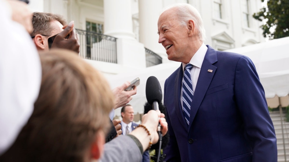 President Biden speaks with members of the media