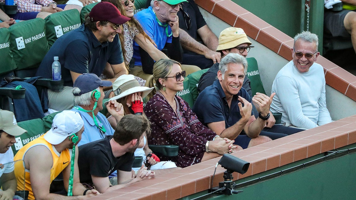 Actor Ben Stiller interacts with Ben Stiller at a Tennis match