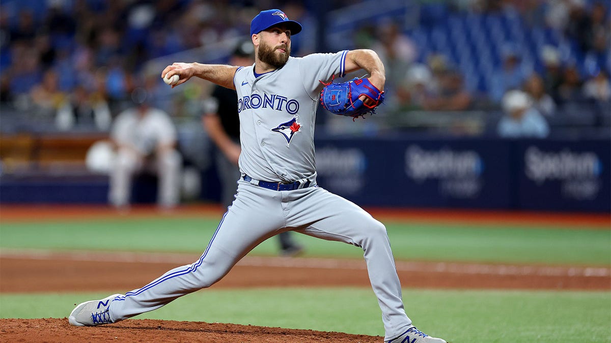 Anthony Bass #52 of the Toronto Blue Jays pitches in the seventh inning during a game against the Tampa Bay Rays at Tropicana Field on May 22, 2023 in St Petersburg, Florida. 