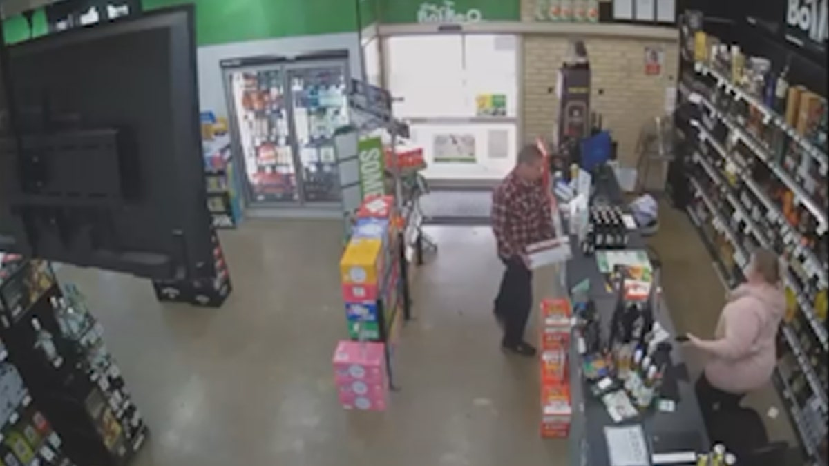Man returns alcohol to cashier