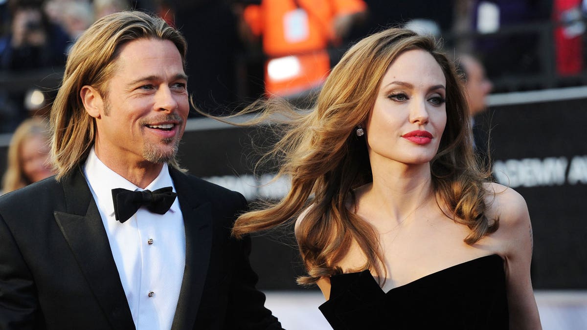 Brad Pitt and Angelina Jolie on a red carpet