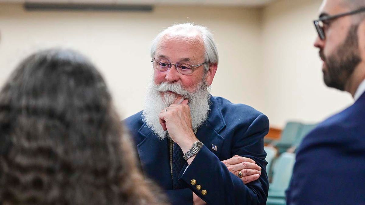 Bill Thompson listens successful an Idaho courtroom