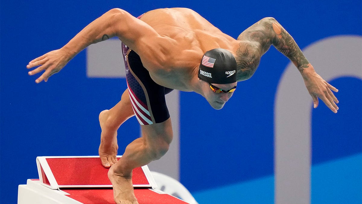 Caeleb Dressel leaps into water