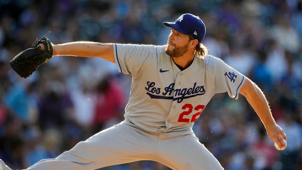 Clayton Kershaw throws pitch