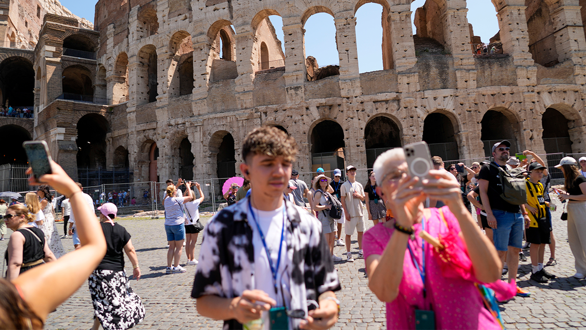 Tourist outside the Colosseum