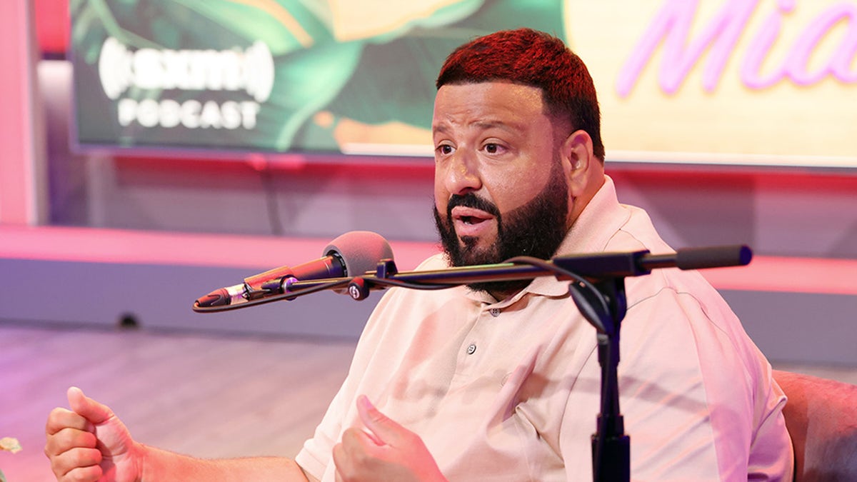 DJ Khaled in front of microphone