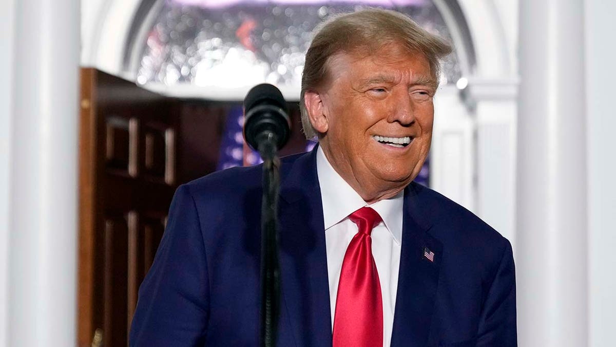 Former President Donald Trump smiling