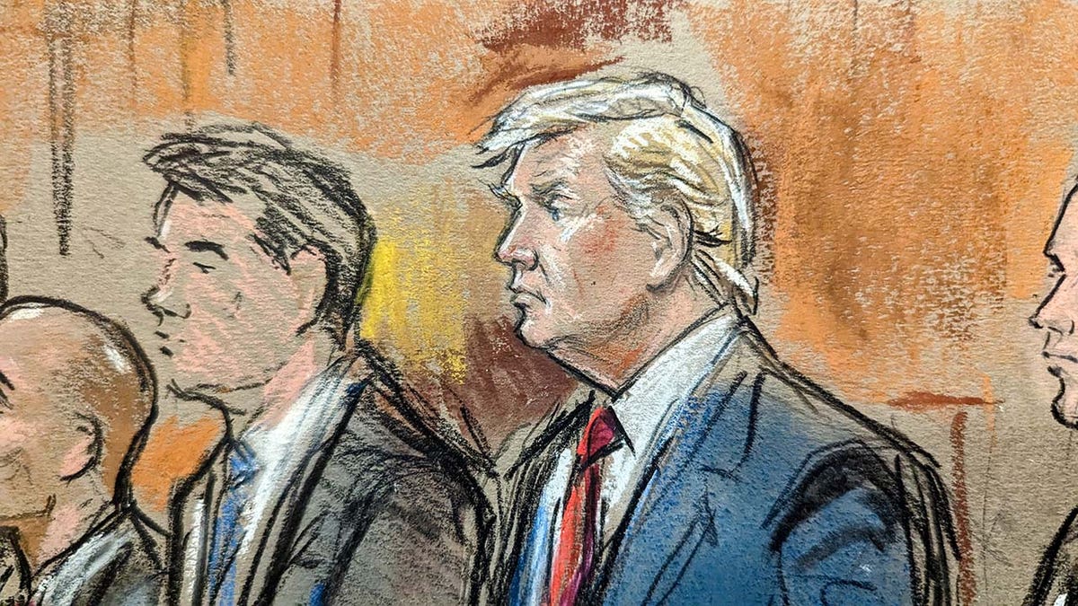 In this court sketch, former President Donald Trump stands alongside his lawyers during his arraignment