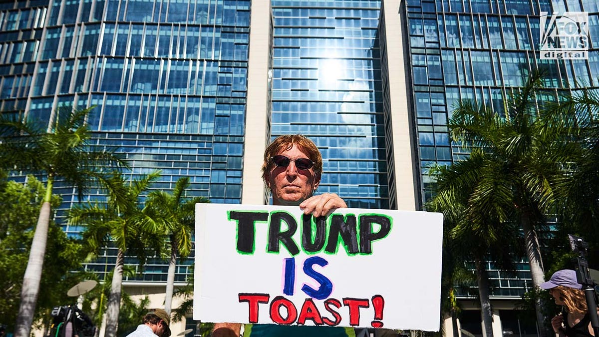 Demonstrators rally outside of a Miami Federal Courthouse ahead of Donald Trumps arraignment