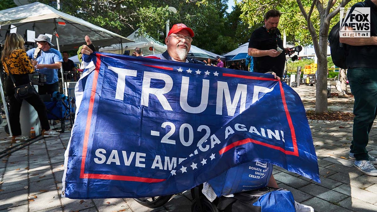 Demonstrators rally outside of a Miami Federal Courthouse ahead of Donald Trump's arraignment