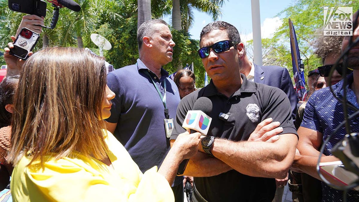 Mayor Francis Suarez of Miami speaks to members of the media outside