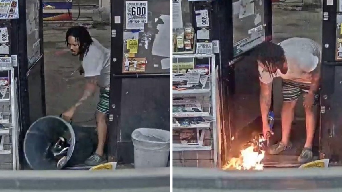 A screenshot of surveillance video showing man bend over to light trash on fire.