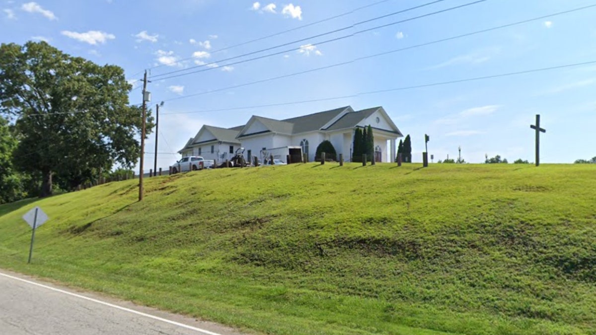 First Baptist Gowensville on top of hill seen from street