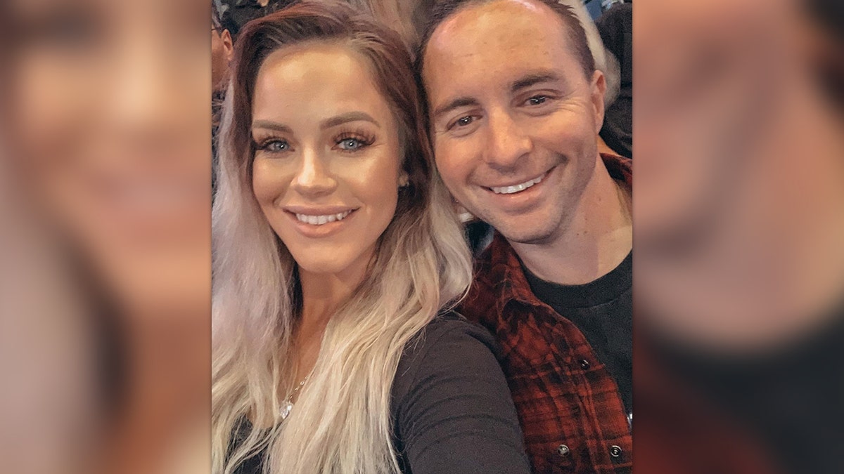 Former Deputy Meagan McCarthy poses with husband