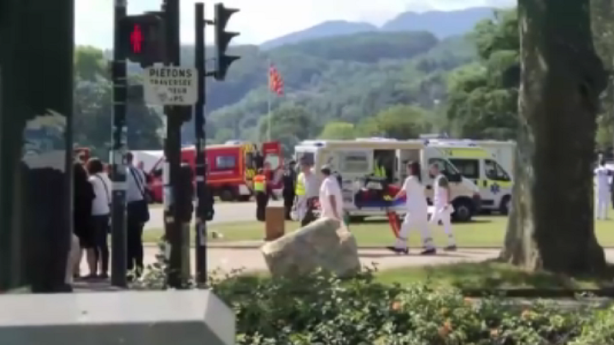 First responders transport a victim away from the scene of the knife attack in Annecy, France, on Thursday, June 8. 