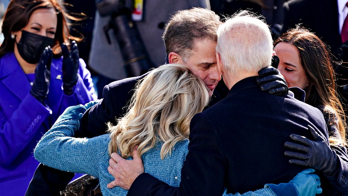 Hunter Biden embraces parents Joe and Jill Biden at the White House