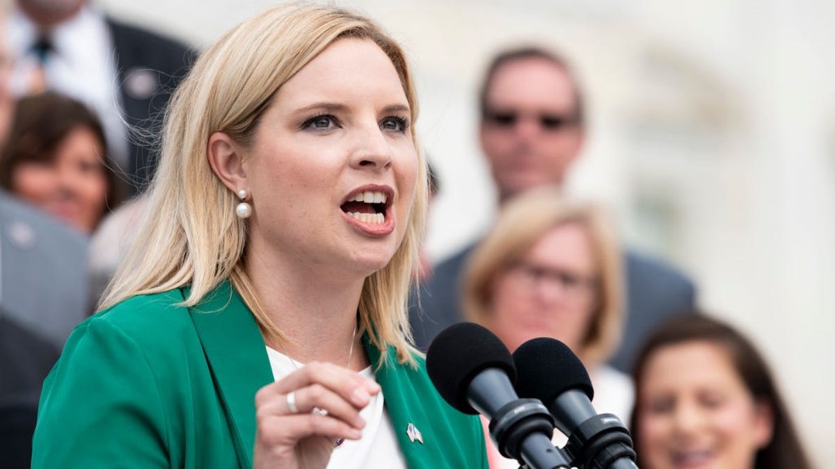 Ashley Hinson in green blazer