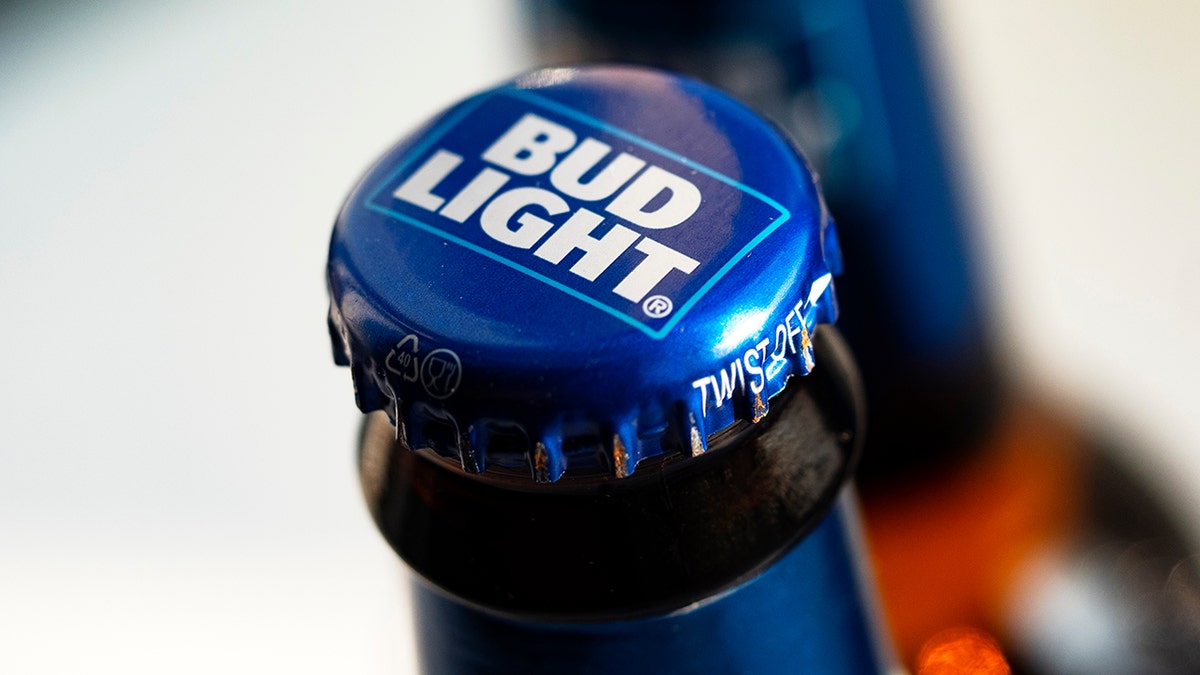 bud light blue bottle cap with white writing