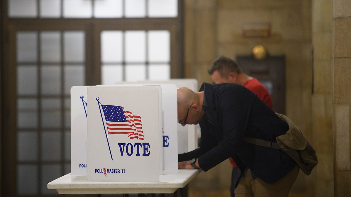 Voter fills out his mail-in ballot