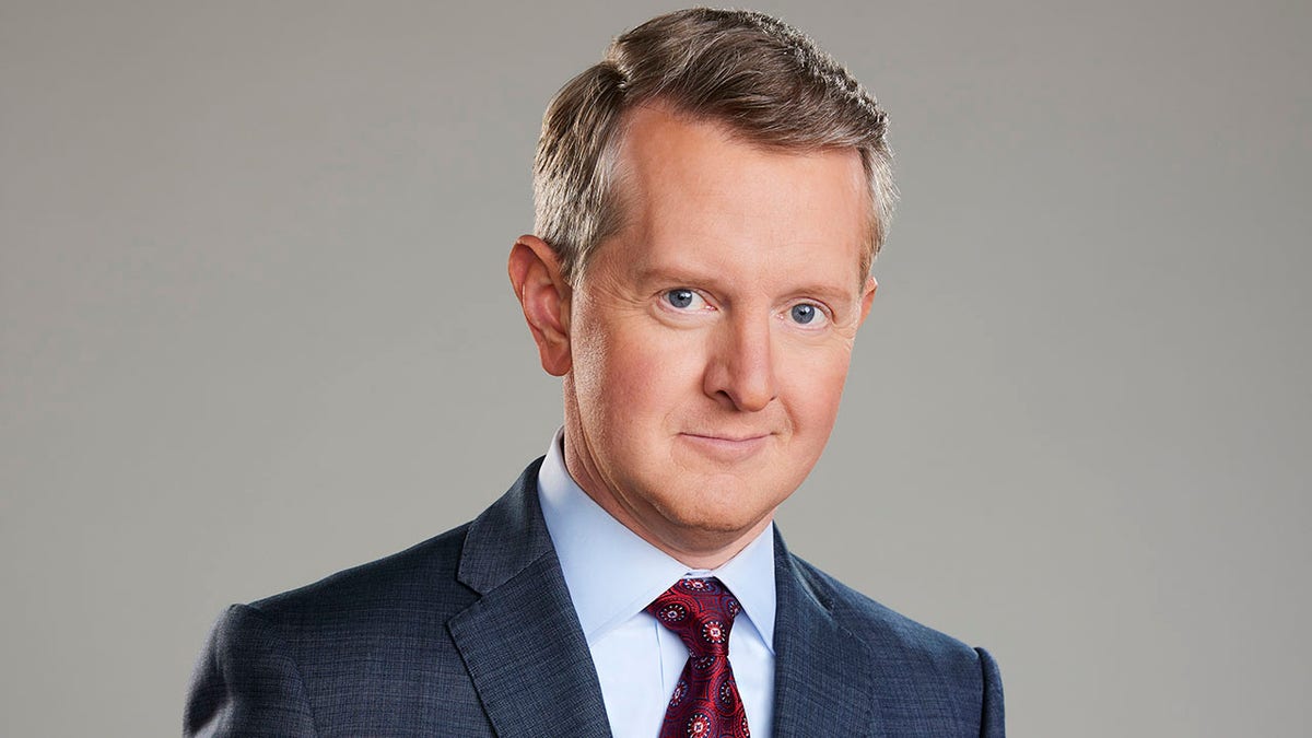 Ken Jennings poses for a photo in a suit