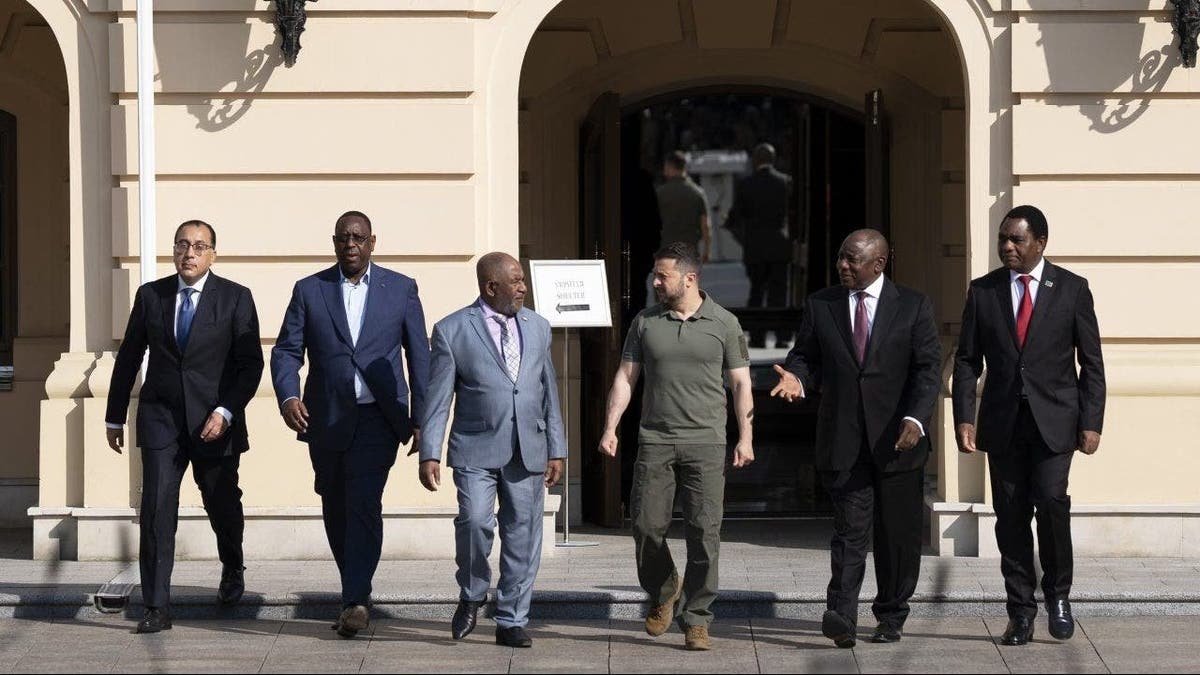 Volodymyr Zelenskiy, Ukraine's president, center, arrives for a news conference with Cyril Ramaphosa, South Africa's president, center right, Hakainde Hichilema, Zambia's president, right, Mostafa Madbouly, Egypt's prime minister, left, Macky Sall, Senegal's president, second left, and Azali Assoumani, Comoros' president, center left, in Kyiv, Ukraine, on Friday, June 16, 2023. Ramaphosa and other African leaders have floated a proposal that they say could help bring an end to Russia's war in Ukraine, but details have been scant.  