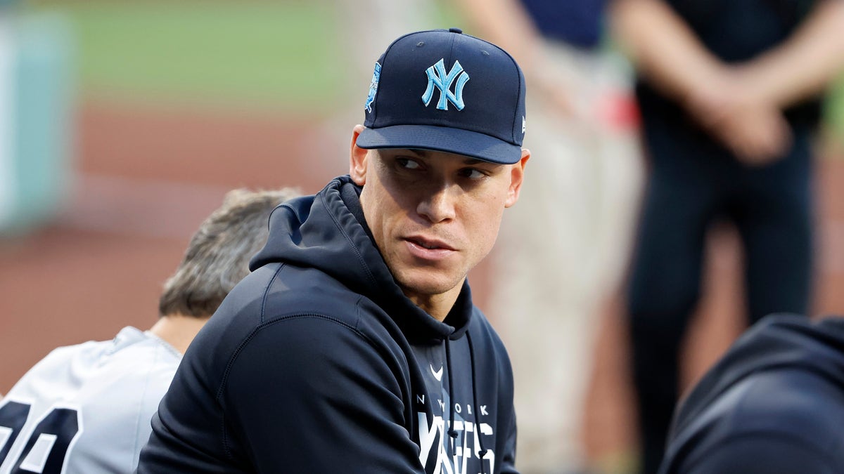 Aaron Judge looks on from the Yankees dugout