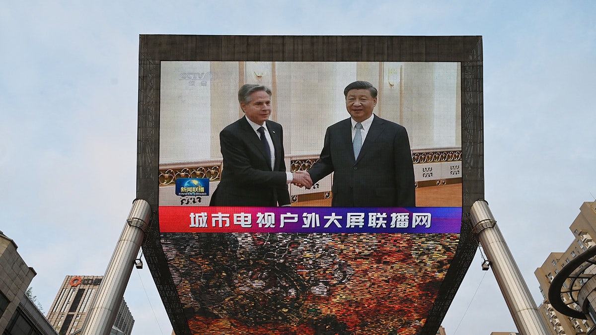 Blinken and Xi shake hands in broadcast in China