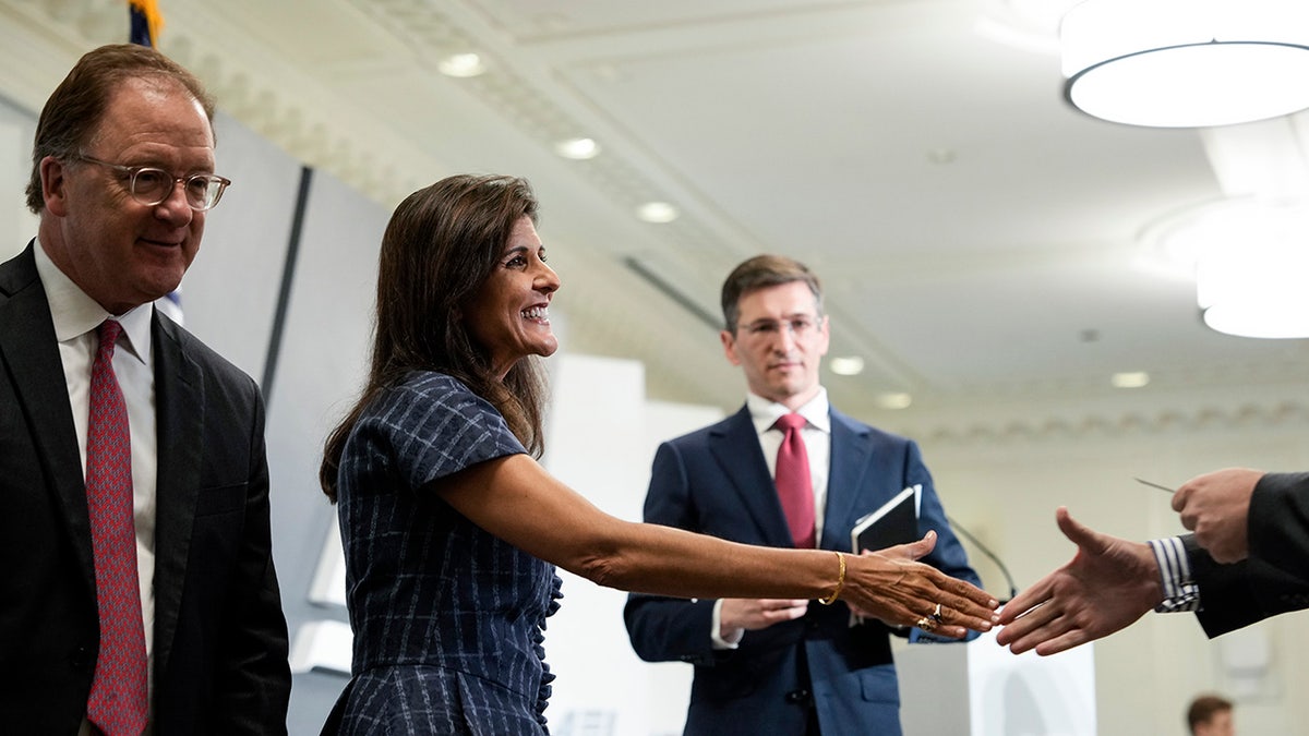 Nikki Haley shakes hands at the American Enterprise Institute