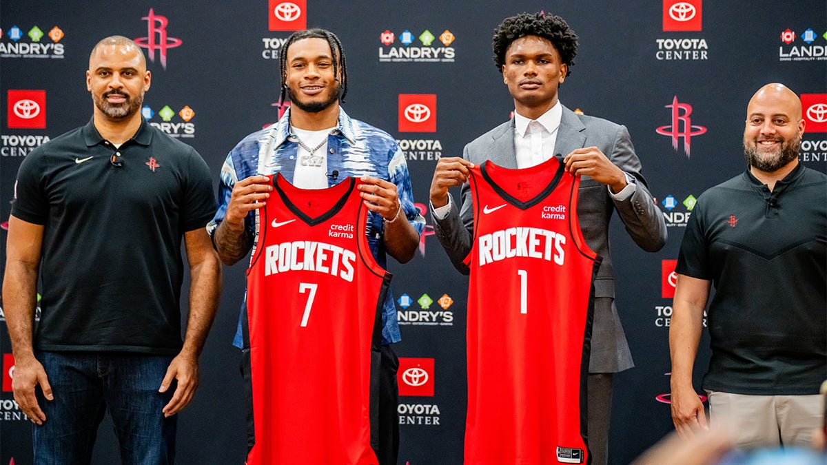 Head Coach Ice, Cam Whitmore #7, Amen Thompson #1 and General Manager Raphael Stone of the Houston Rockets pose for a portrait on June 26, 2023 at the Toyota Center in Houston, Texas. 