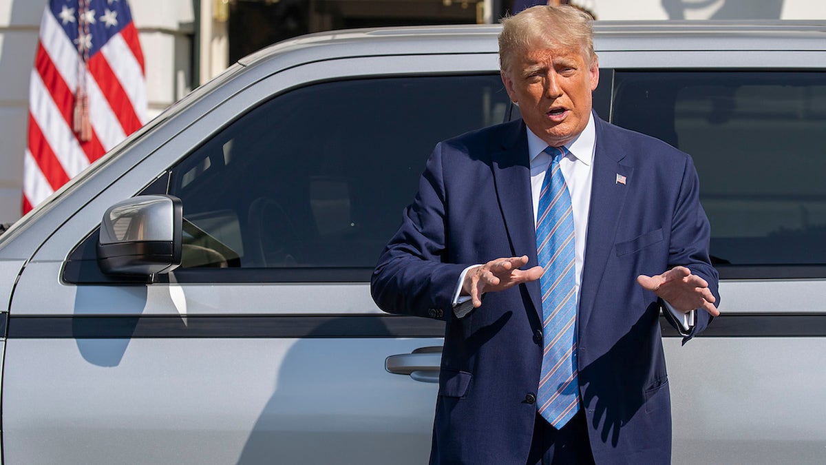 WASHINGTON, DC - SEPTEMBER 28: U.S. President Donald Trump talks about the new Endurance all-electric pickup truck on the south lawn of the White House on September 28, 2020 in Washington, DC. They bought the old GM Lordstown plant in Ohio to build the Endurance all-electric pickup truck, inside those four wheels are electric motors similar to electric scooters. (Photo by Tasos Katopodis/Getty Images)