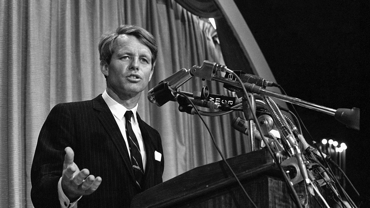 Robert F. Kennedy at a press conference