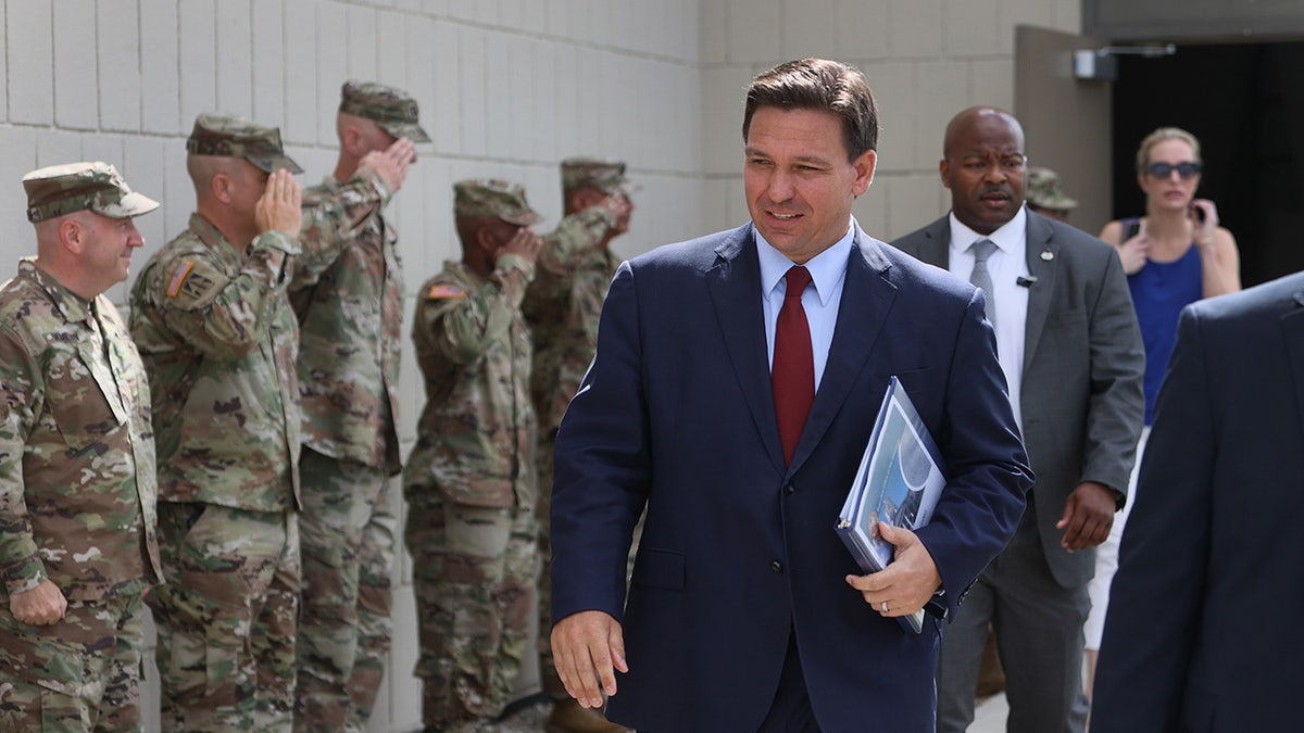 DeSantis walks by troops