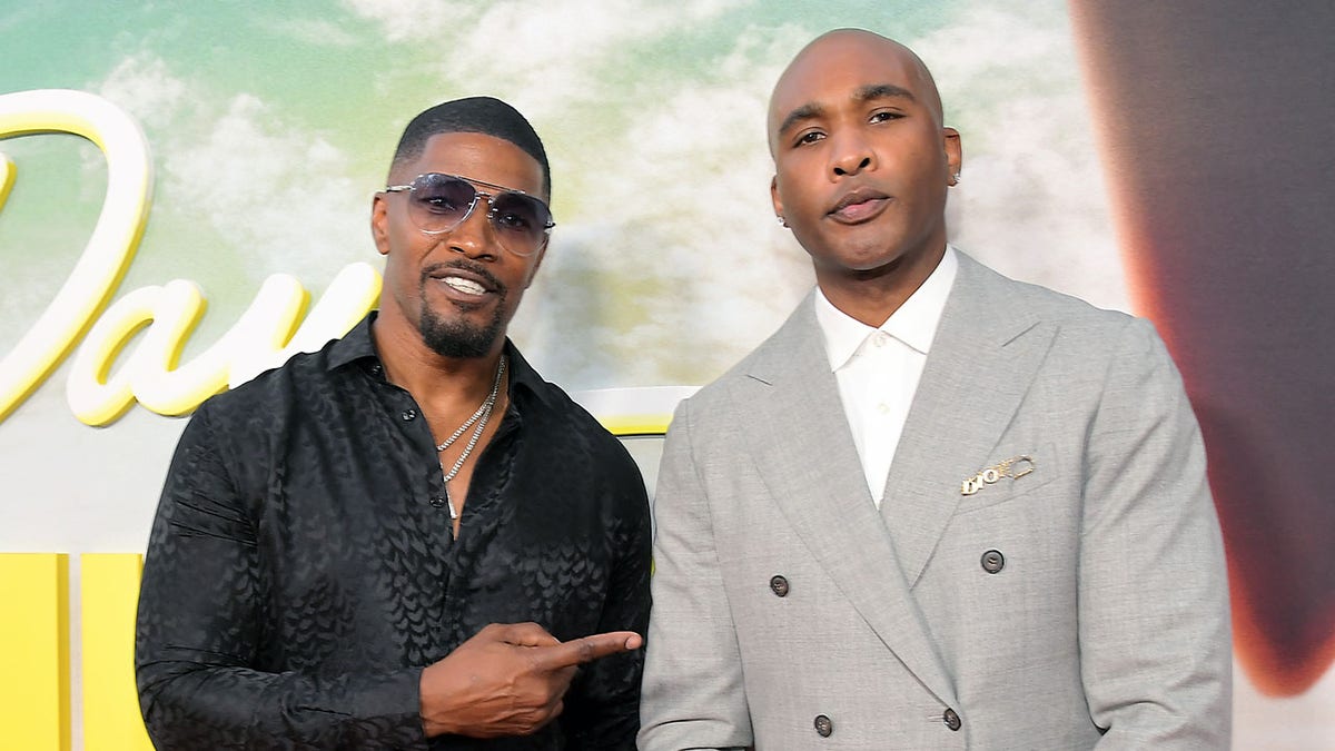 Jamie Foxx and Datari turner attending movie premiere