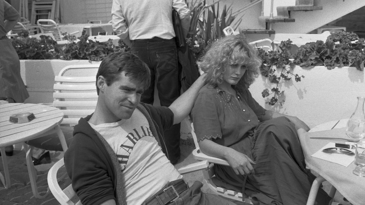 Black and white photo of Treat Williams and Beverly D'Angelo in Cannes