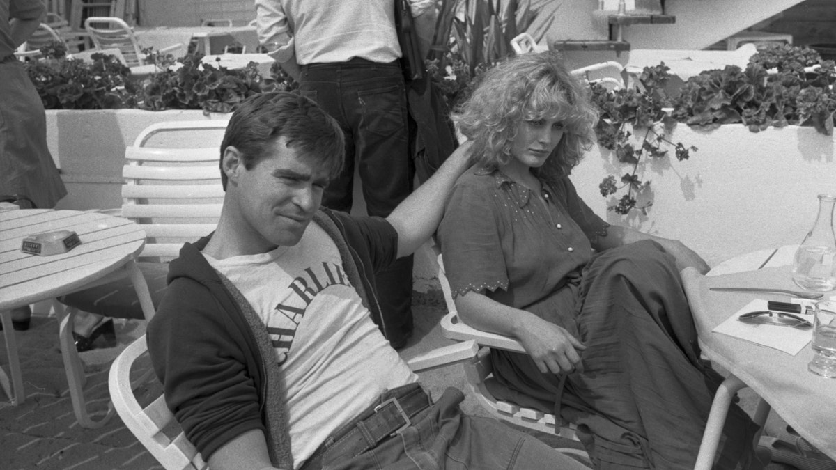 Black and white photo of Treat Williams and Beverly D'Angelo in Cannes