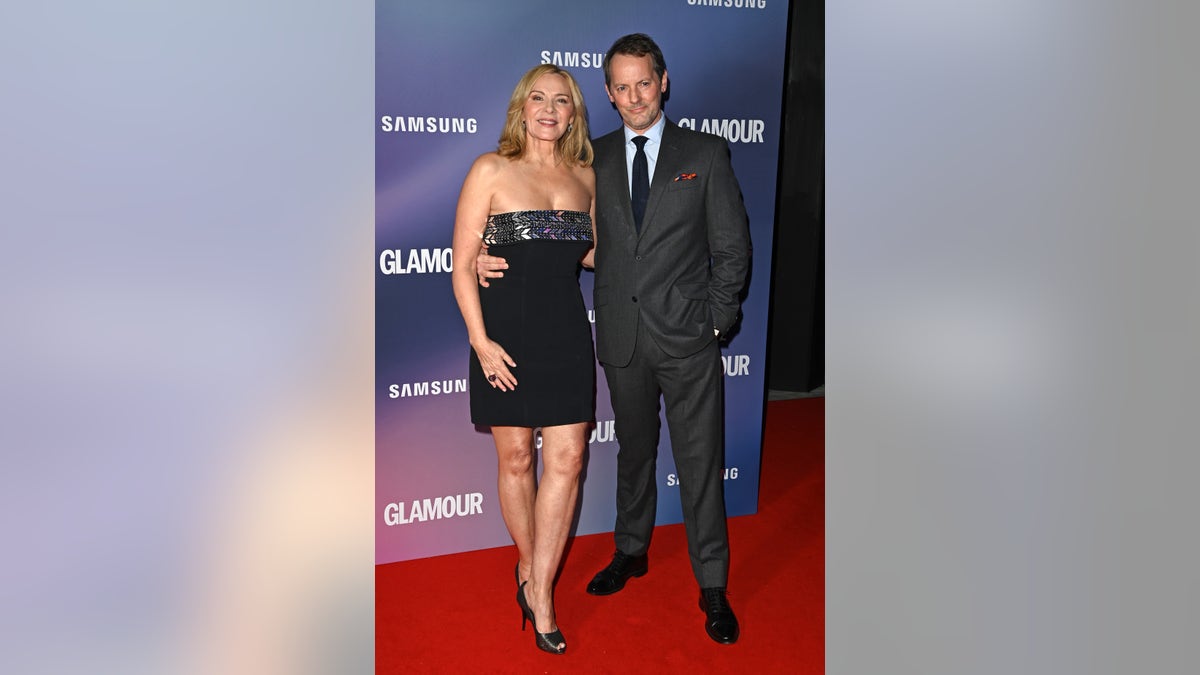 Kim Cattrall with boyfriend Russell Thomas on the red carpet
