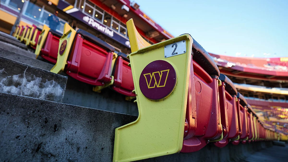 Seats at the Commanders stadium with the team logo