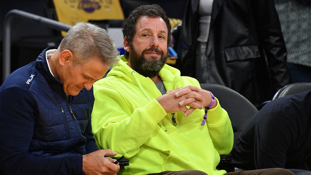 Adam Sandler attends an NBA game