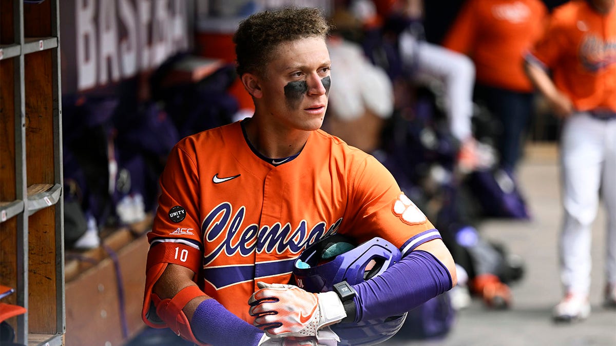 Cam Cannarella stands in the dugout