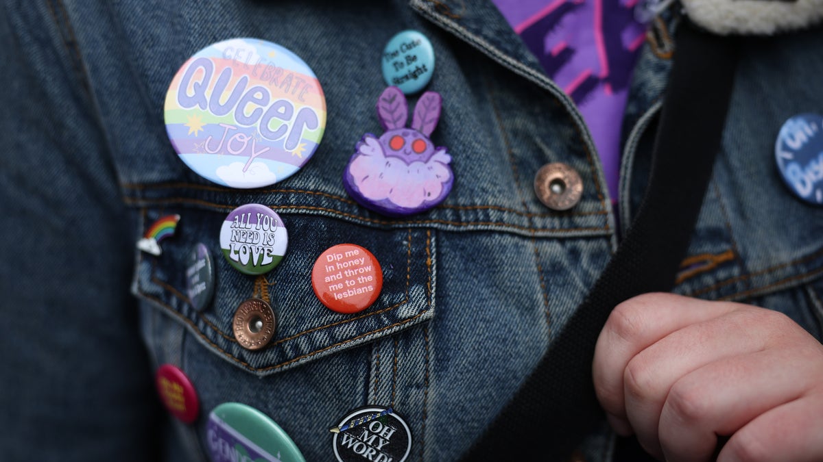 LGBTQ pins on a jacket