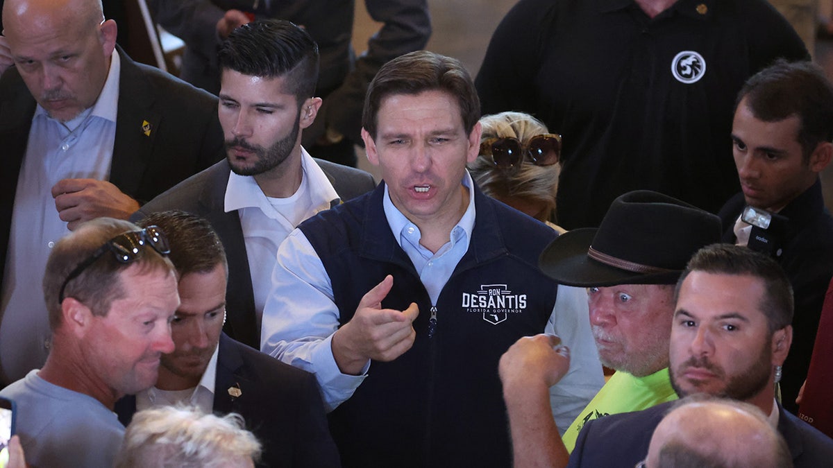 Florida Gov. Ron DeSantis greets voters in Iowa
