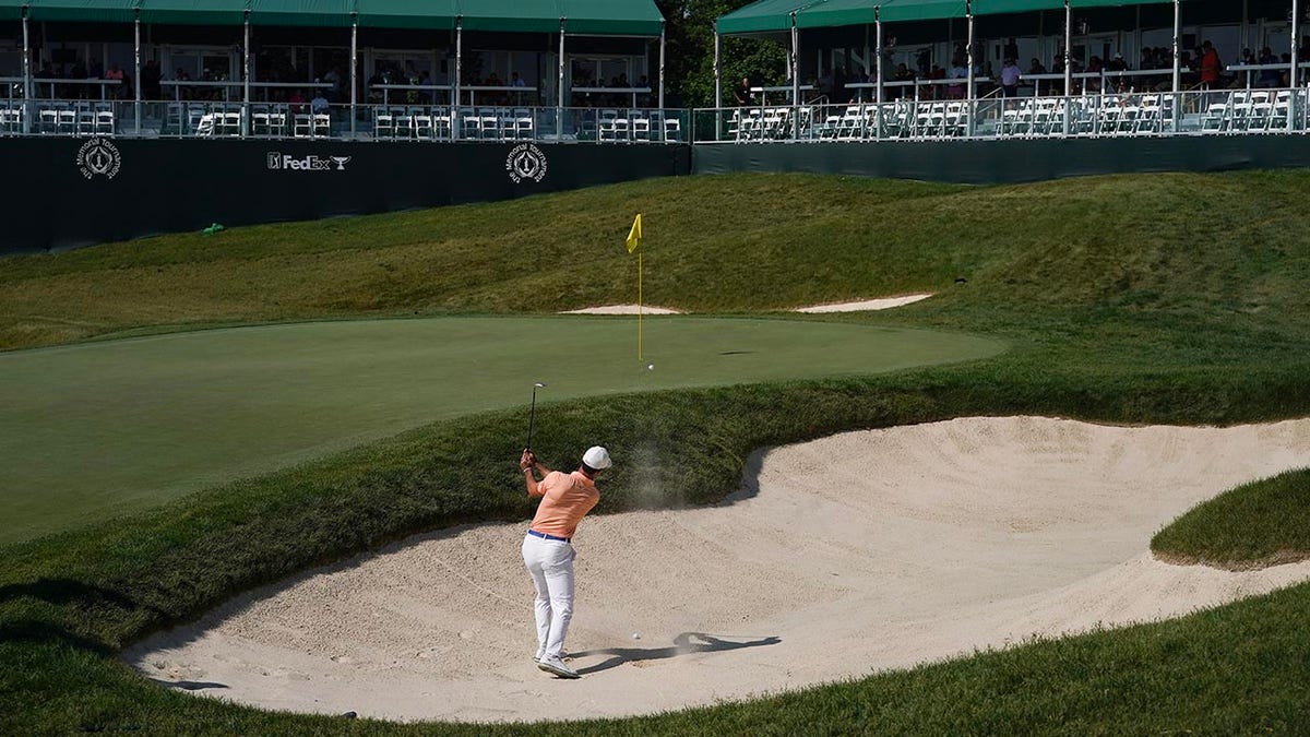 Billy Horschel plays a bunker shot