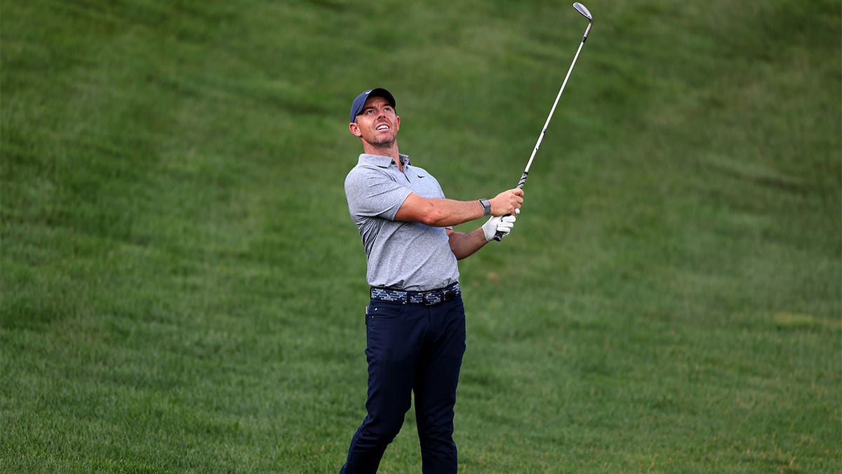 Rory McIlroy plays a shot during a practice round