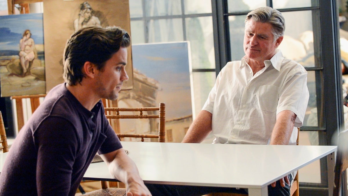 Matt Bomer and Treat Williams in a scene from White Collar