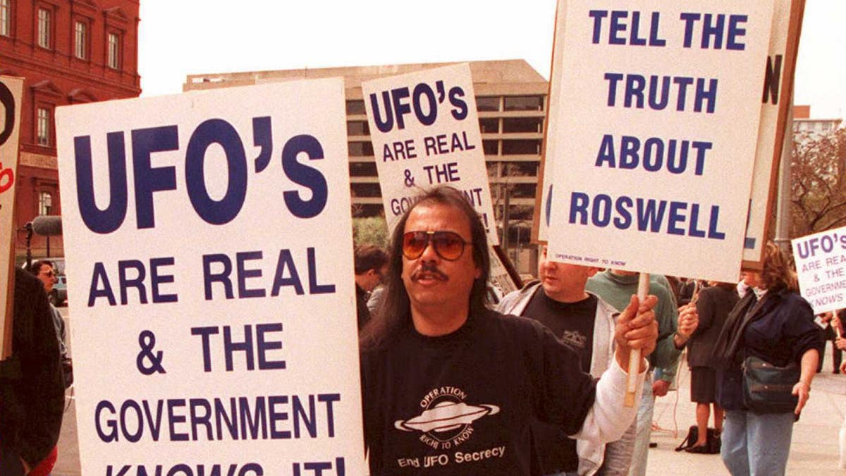 UFO Protestor with sign